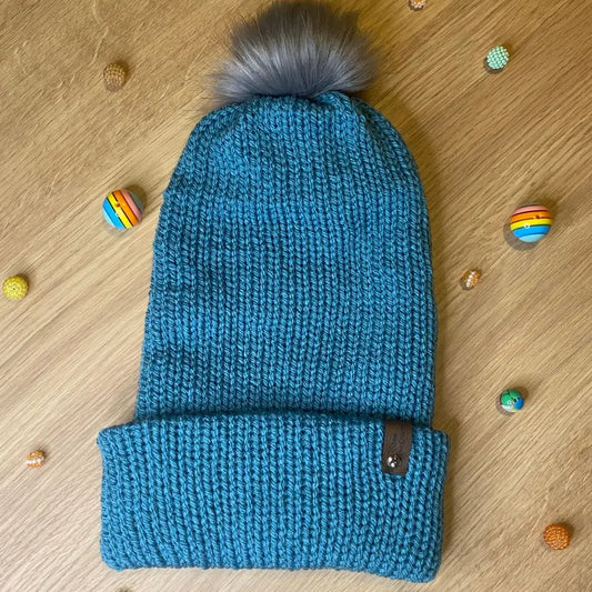 Storm Blue Knitted Hat with Faux Fur Pom and Faux Leather Tag - WINTER HAT KNITTED