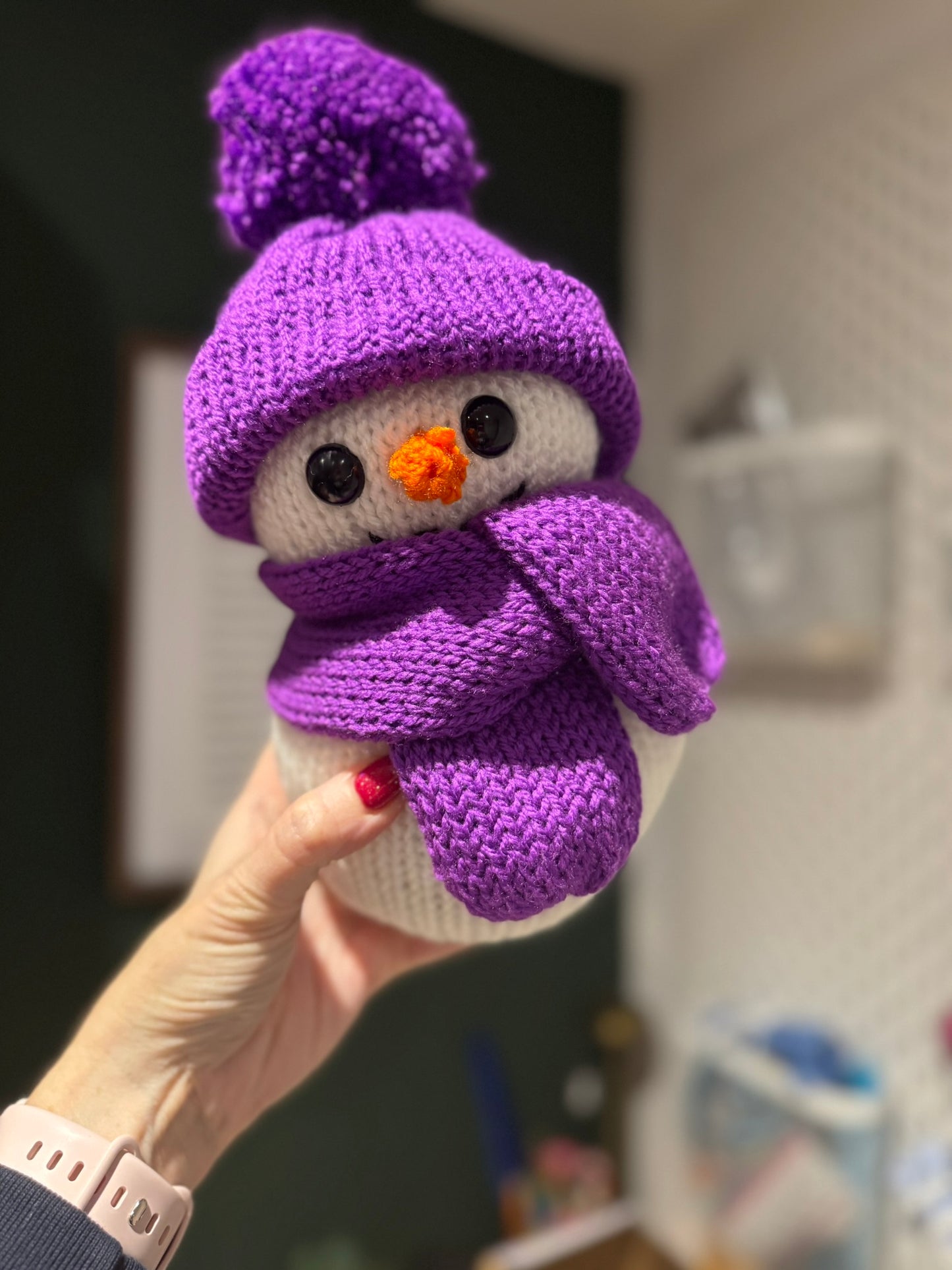 Purple knitted snowman